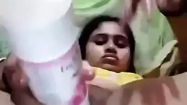 Desi babe using room freshener bottle to masturbate