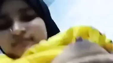 Hijab girl showing tits like juicy big round melons