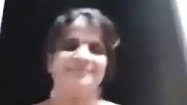 Big boobed Indian aunty naked solo